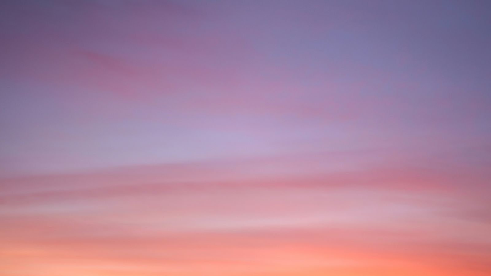 Purple-to-orange sunset gradient sky at dusk